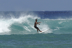 Photo of a man surfing
